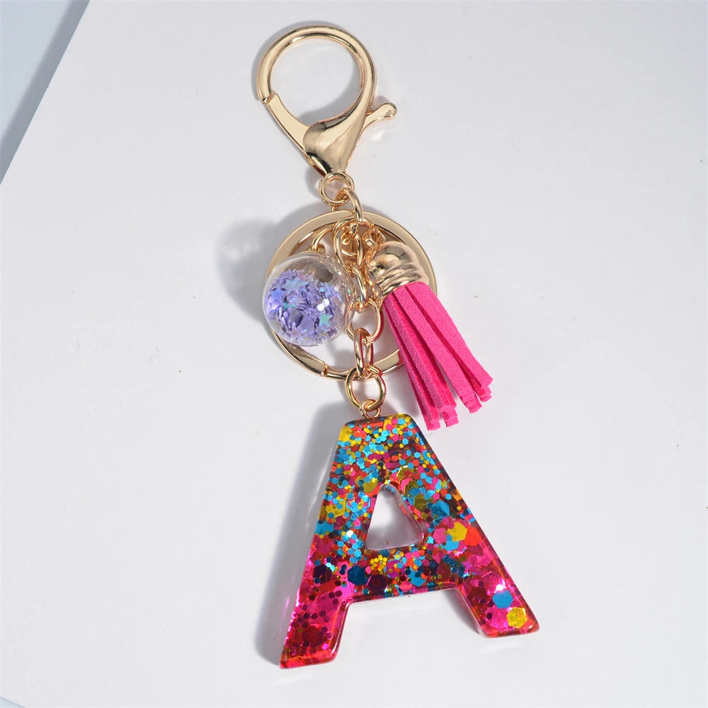 Mystery Star Ball 26 Letters Tassel Fuchsia Keychain