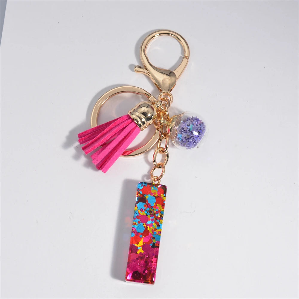Mystery Star Ball 26 Letters Tassel Fuchsia Keychain