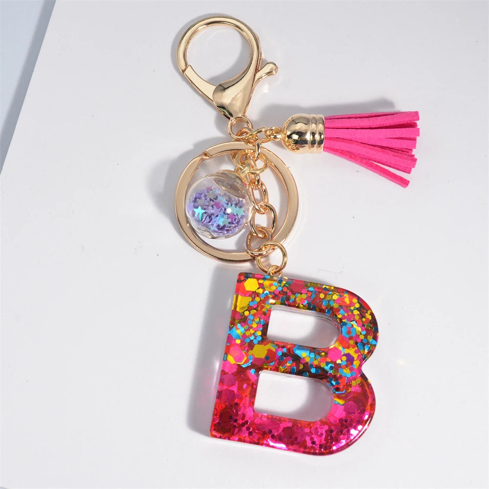 Mystery Star Ball 26 Letters Tassel Fuchsia Keychain